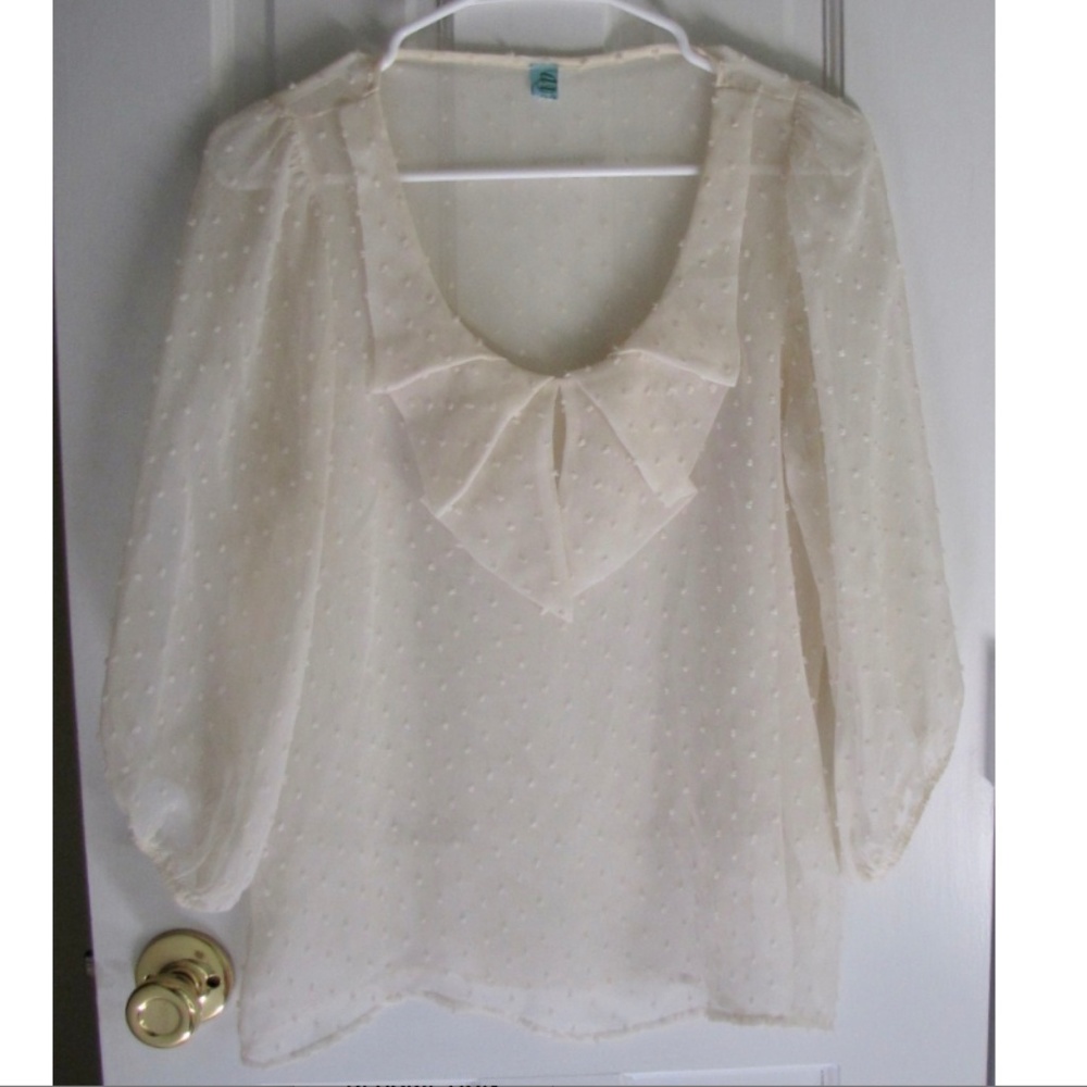 Sheer cream blouse